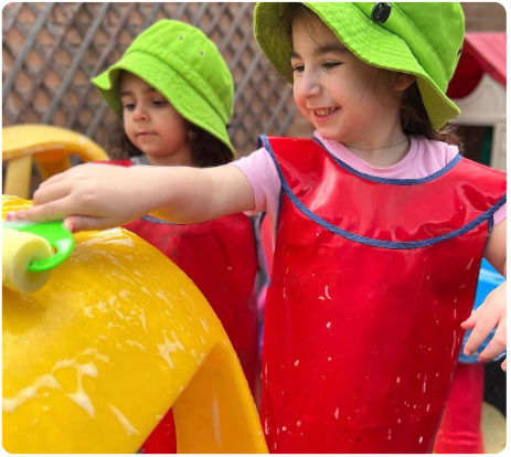 Daycare students enjoying the secure outdoor playground facility at our Punchbowl childcare center
